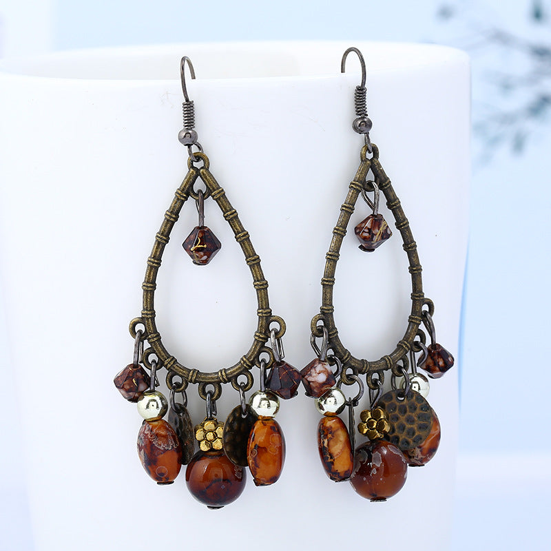 Wholesale Fashionable ethnic retro hollow water drop beaded tassel earrings